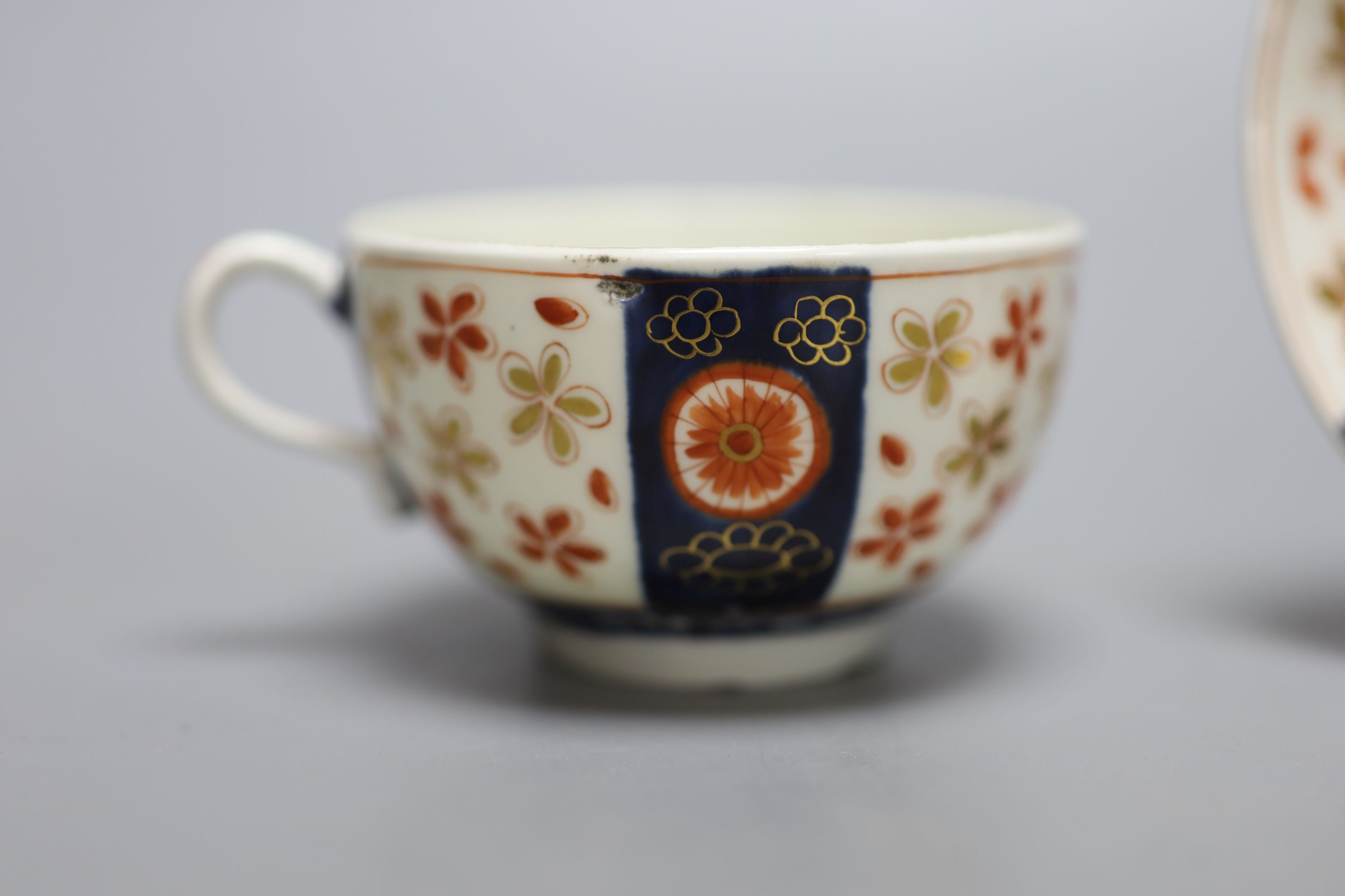 An 18th century Worcester cup and saucer painted with the Old Japan Star pattern, diameter 13cm